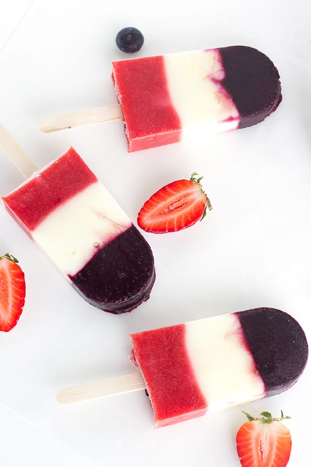 Red White and Blue Berry Yogurt Pops - Yogurt Pops for the 4th of July. They're full of fresh berries and lemon yogurt!