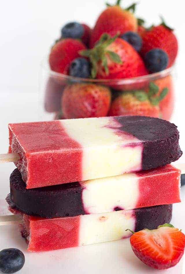 Red White and Blue Berry Yogurt Pops - Yogurt Pops for the 4th of July. They're full of fresh berries and lemon yogurt!