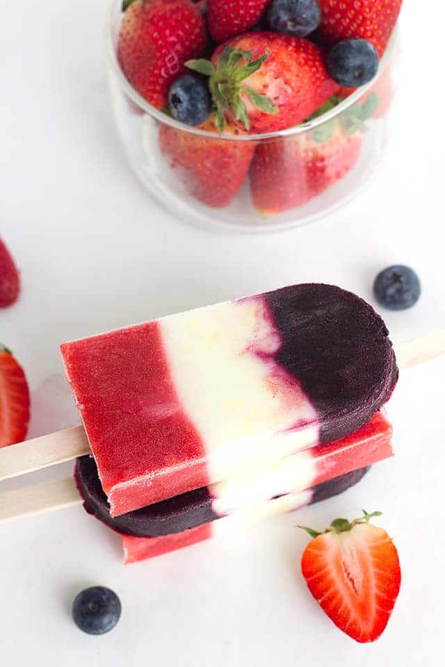 Red White and Blue Berry Yogurt Pops - Yogurt Pops for the 4th of July. They're full of fresh berries and lemon yogurt!