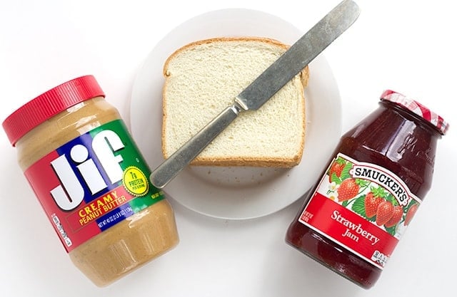 Ingredients needed for toasted peanut butter and jelly sandwich