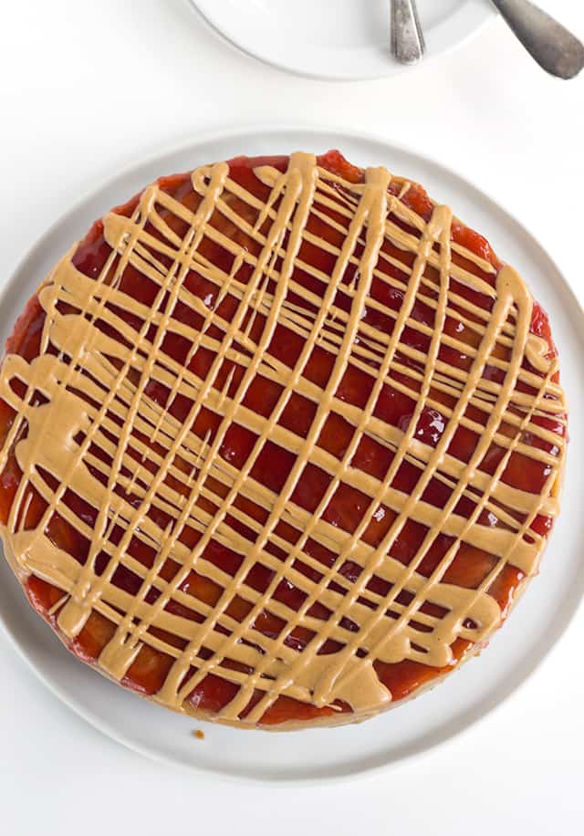 overhead of peanut butter and jelly cheesecake showing the topping