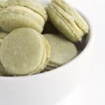 Green Tea French Macarons - delicious tea flavored french macarons with a roasted green tea infused white chocolate ganache filling. Don't worry about buying matcha powder either!