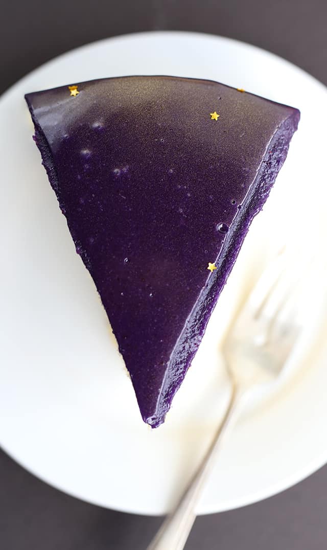 beautiful slice of violet colored Jell-o Mirror Glaze Cake