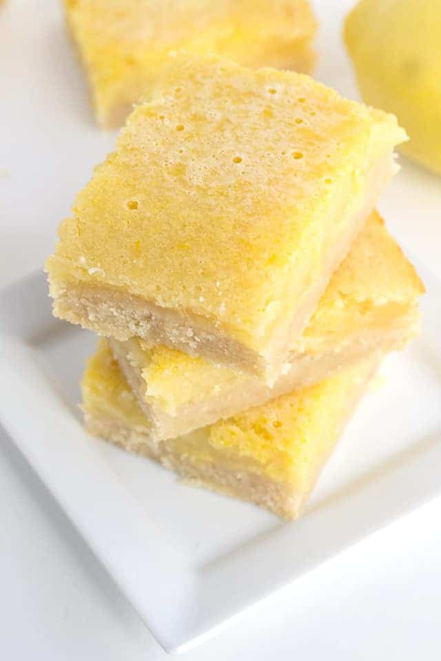 Lemony Lemon Bars - these easy lemon bars are a hit every time I make them! They're sweet with loads of tangy lemon flavor to them.