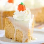 Pumpkin cheesecake slice on a plate.