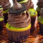 Easy Witch Hat Cupcakes - cupcakes colored green, topped with a rich chocolate frosting swirl, green candy melts, and the cutest witch hat ever!