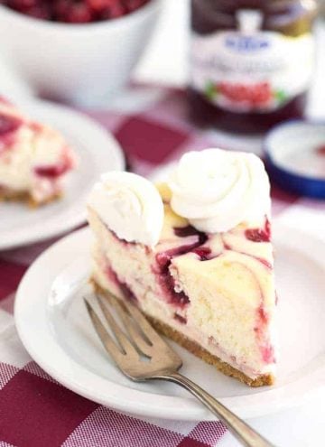Cranberry Red Currant Cheesecake - Creamy vanilla cheesecake with swirls of cranberry and red currant throughout it. This cheesecake is perfect for the holidays!