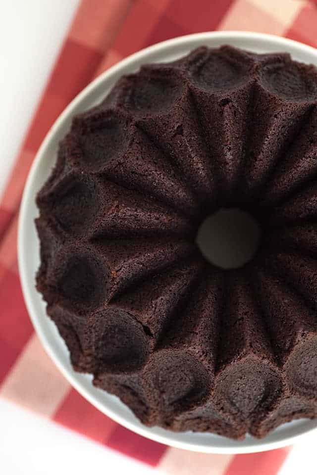 Chocolate Mayonnaise Bundt Cake - chocolate cake made with mayonnaise instead of butter and eggs! Pour it into a beautiful bundt pan. Top with a chocolate glaze for a pretty and tasty finish.