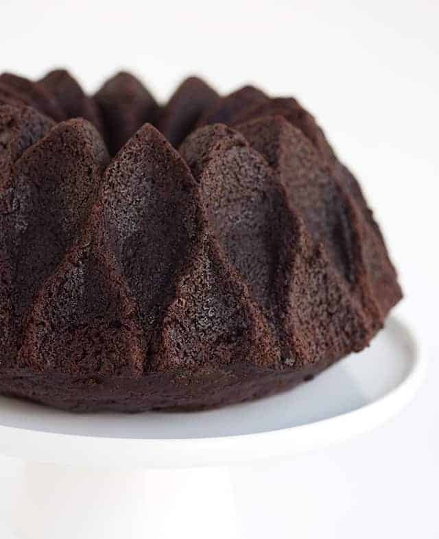 Chocolate Mayonnaise Bundt Cake - chocolate cake made with mayonnaise instead of butter and eggs! Pour it into a beautiful bundt pan. Top with a chocolate glaze for a pretty and tasty finish.