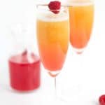 peach raspberry bellini with a raspberry syrup