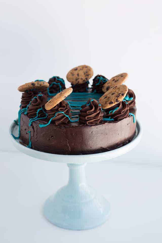 Cookie Monster Cheesecake on a blue cake plate