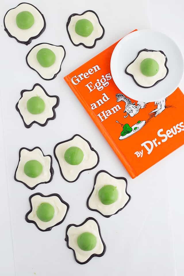 overhead shot of green eggs on a Dr. Seuss Green Eggs and Ham book.