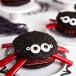Spider Whoopie Pies on a white plate with black spider web
