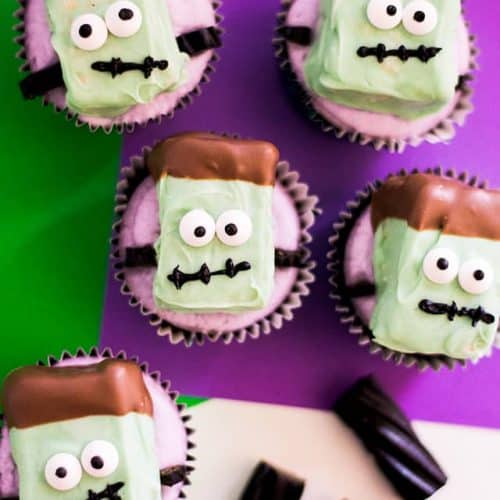 Frankenstein Cupcakes with black licorice and purple background