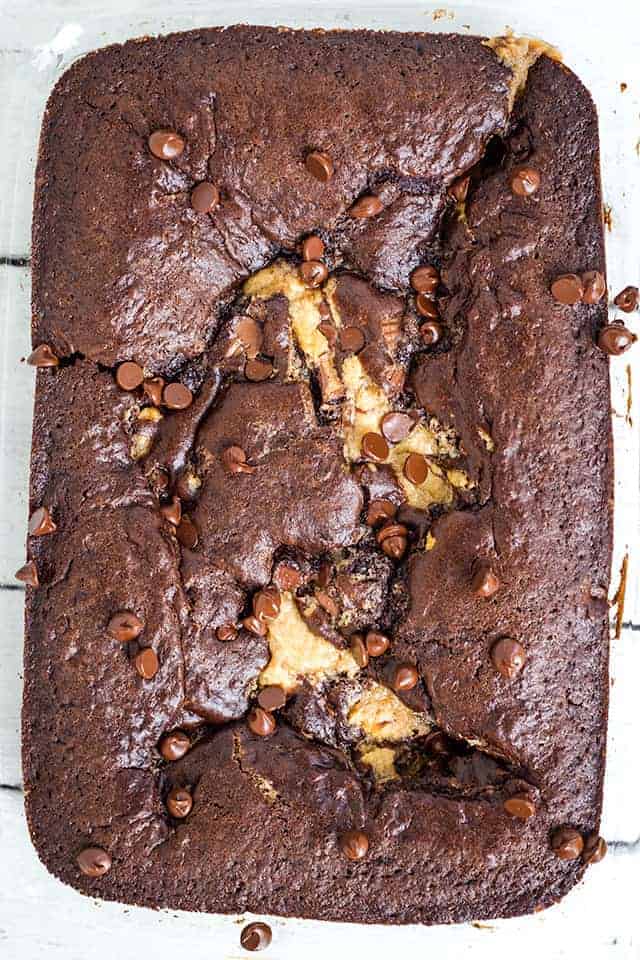 overhead photo of baked chocolate peanut butter earthquake cake showing peanut butter and chocolate chips