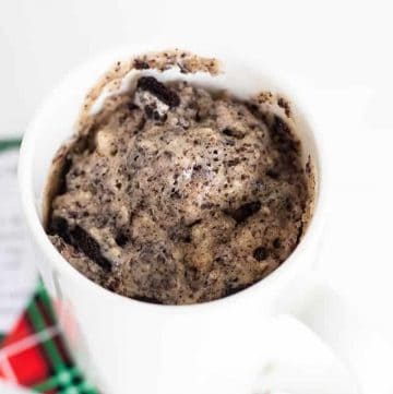 cookies n' cream mug cake in white cup