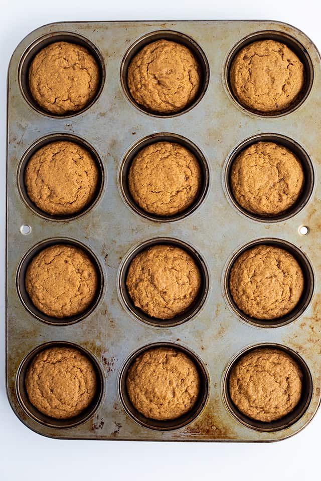 Fudge Filled Gingerbread Cookie Cups - There's nothing better than a tasty Christmas cookie this time of the year! These fudge filled gingerbread cookie cups will not disappoint. They're chewy, loaded with flavor, and filled with an easy buttered rum fudge.