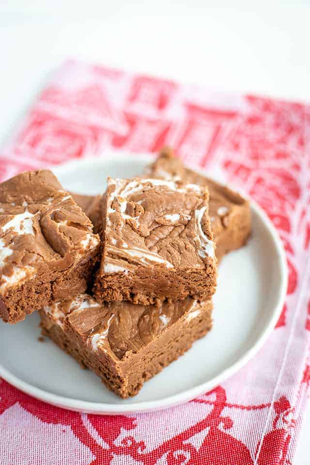 chocolate marshmallow fudge on a white plate