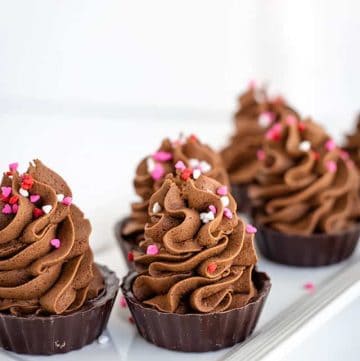 chocolate mousse cups with heart sprinkles