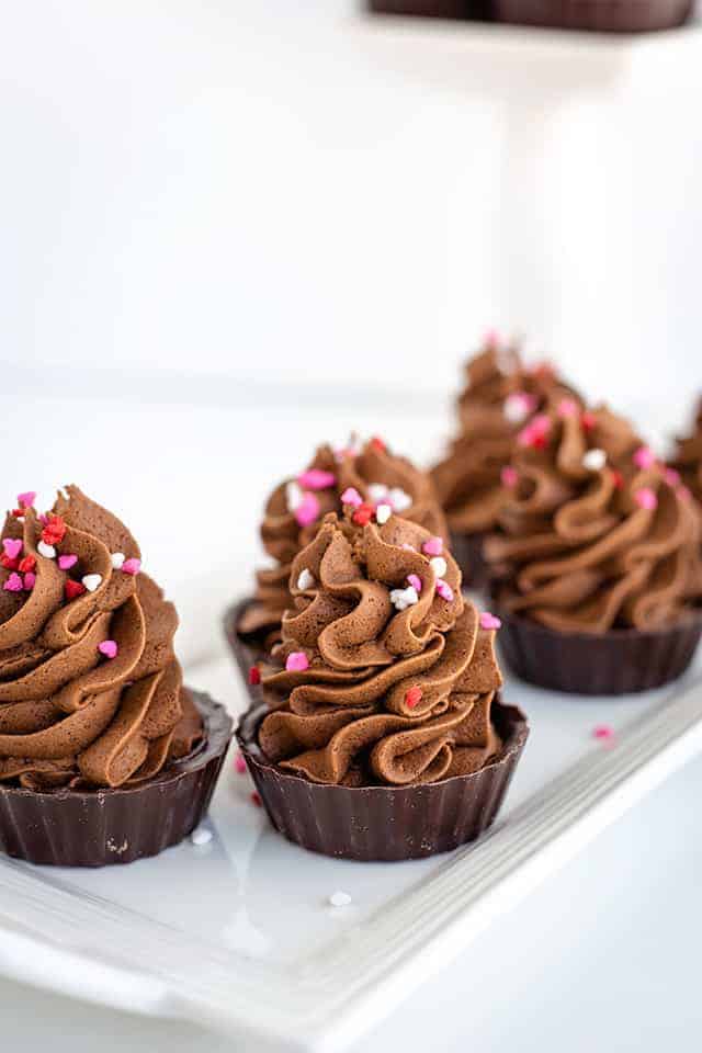 chocolate mousse cups with heart sprinkles