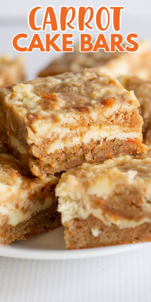 Carrot cake bars presented on a white plate.