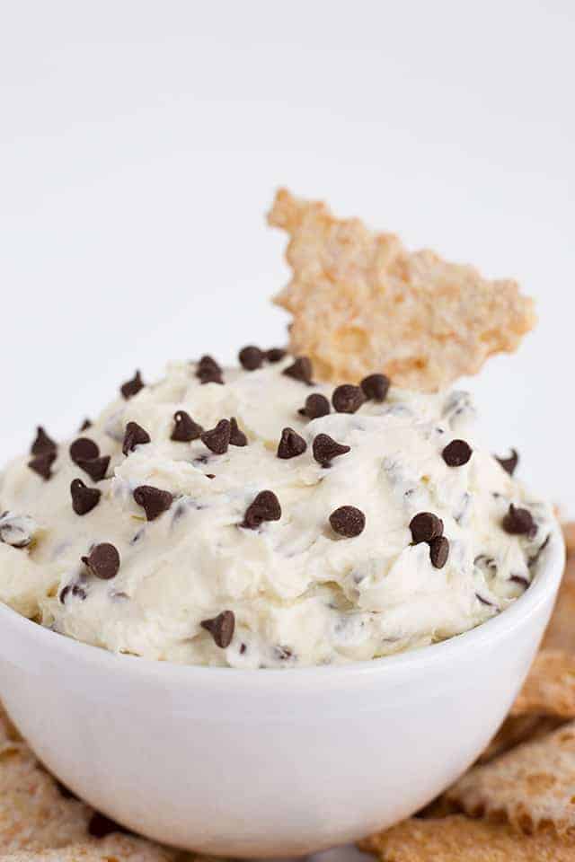 white bowl filled with cannoli dip and mini chocolate chips