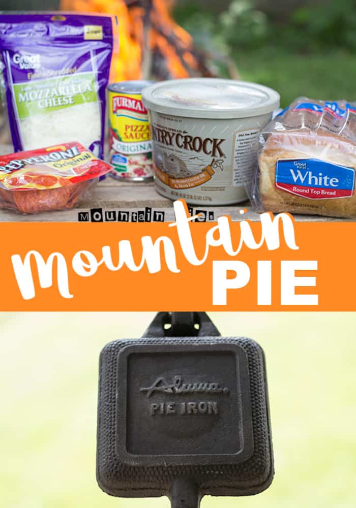 A picture of a campfire with a mountain pie resembling a pizza.