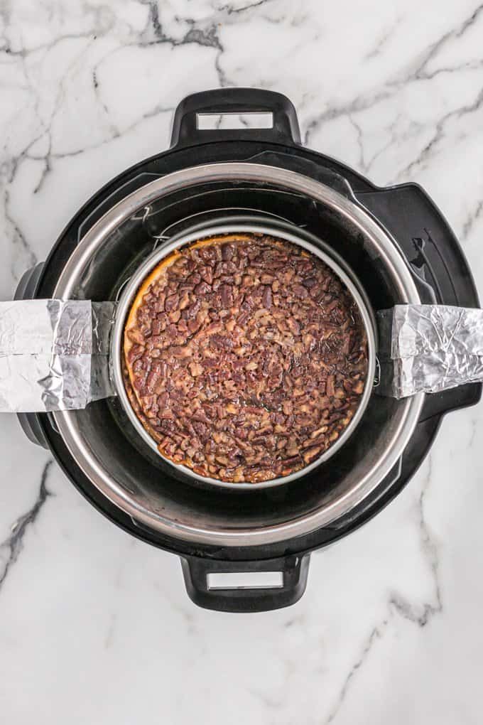 overhead image of the pecan pie cheesecake in the instant pot