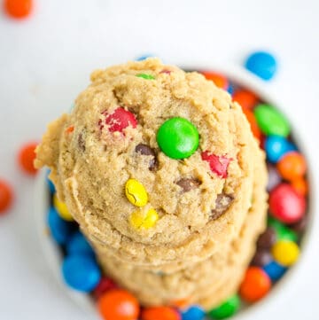 overhead photo of monster cookies sitting on M&M's