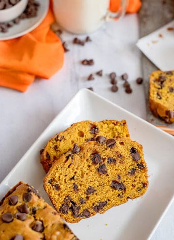 two slices of pumpkin chocolate chip bread on a plate