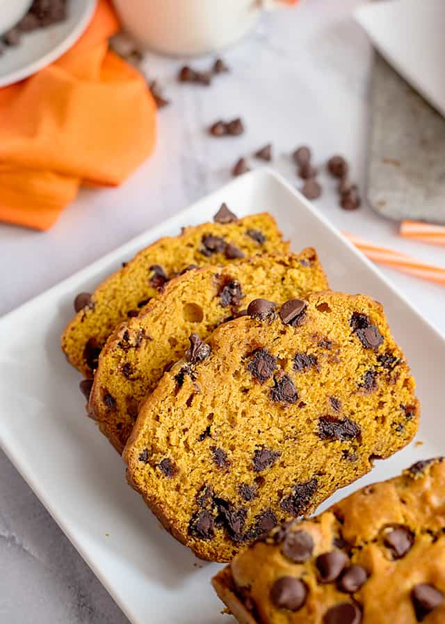 3 slices of pumpkin chocolate chip bread on serving plate