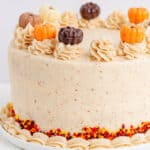 A pumpkin spice cake decorated with icing.