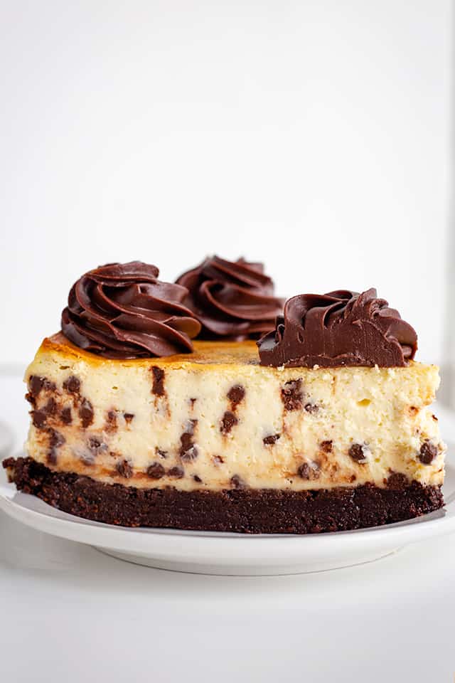 side of a slice of brownie chocolate chip cheesecake