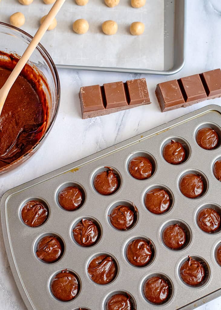 mini muffin pan filled with brownie batter