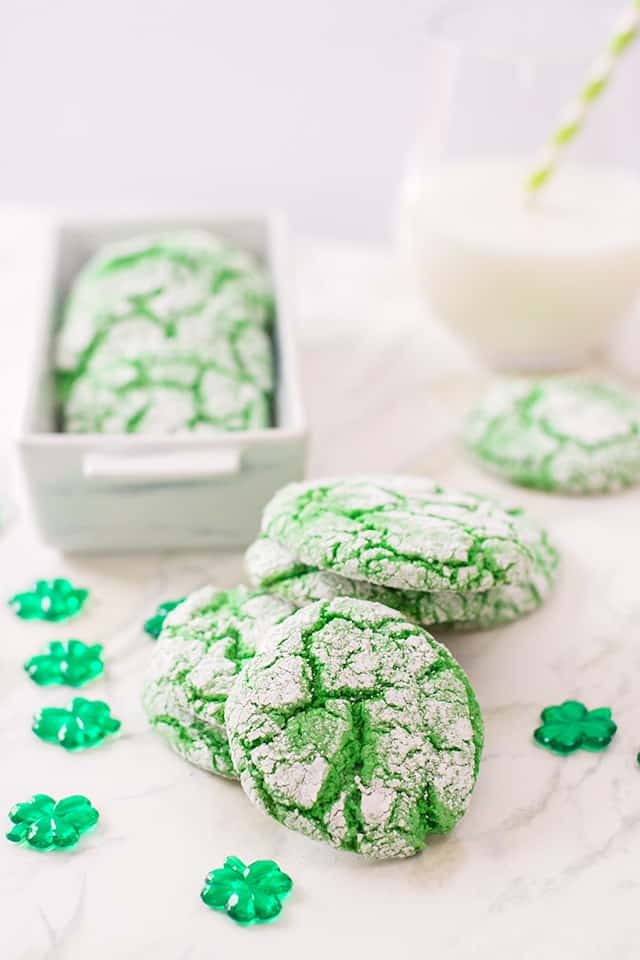 green St. Patrick's Day Cookies on a marble table with shamrocks
