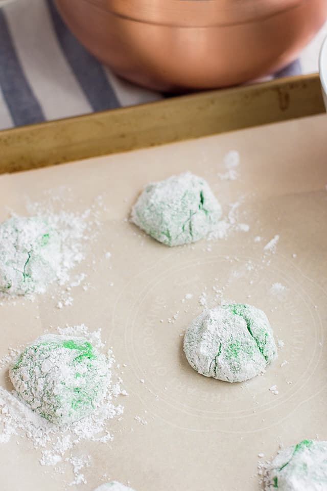 Cake Mix Crinkle Cookie dough on a parchment paper lined baking sheet