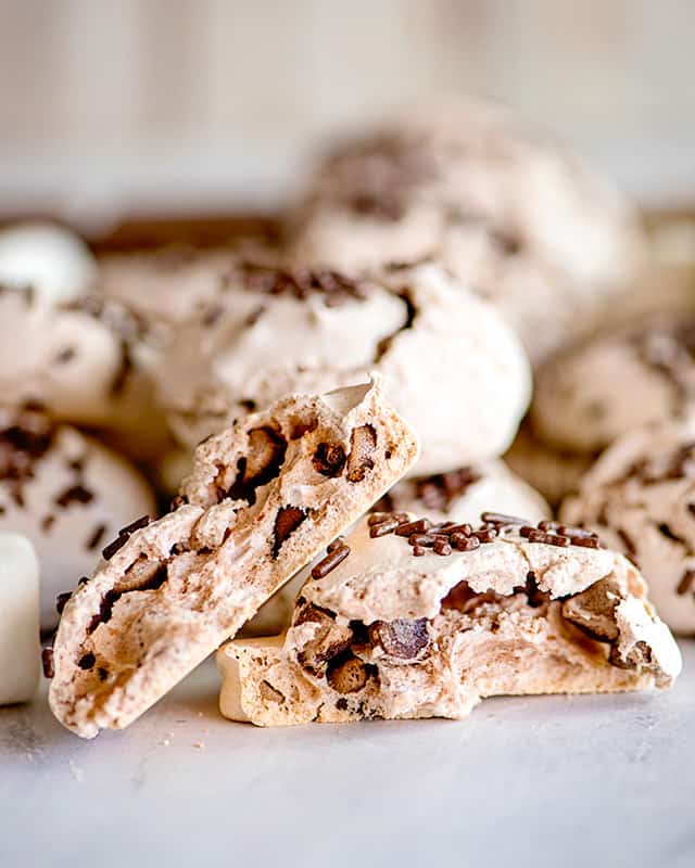 hot chocolate meringue cookie broke in half to see the inside