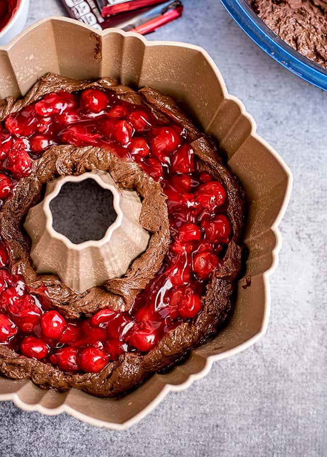 chocolate cherry bundt cake being made in bundt pan