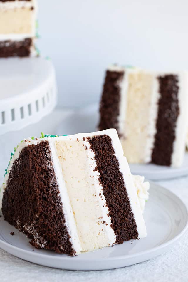 slice of Guinness and Baileys Cheesecake Cake on a white dessert plate