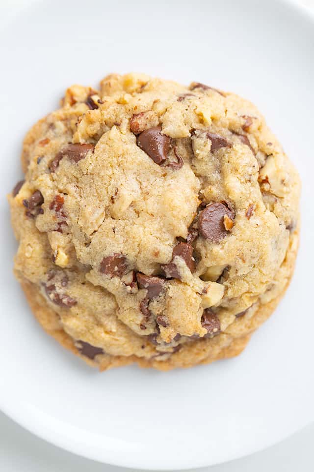 overhead close up photo of a doubletree chocolate chip cookie on a white background