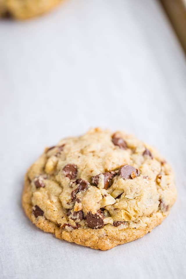 doubletree cookie on a parchment lined cookie sheet