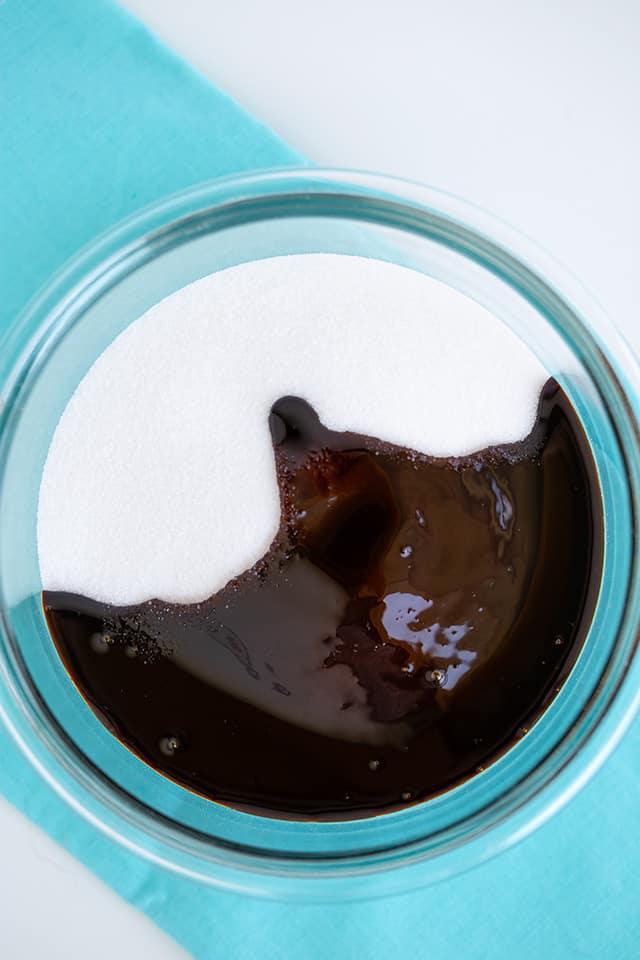 granulated sugar and molasses in a glass bowl