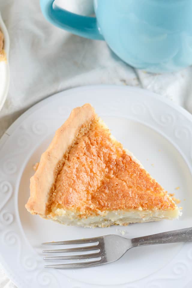 overhead photo of the slice of pie with a fork beside it