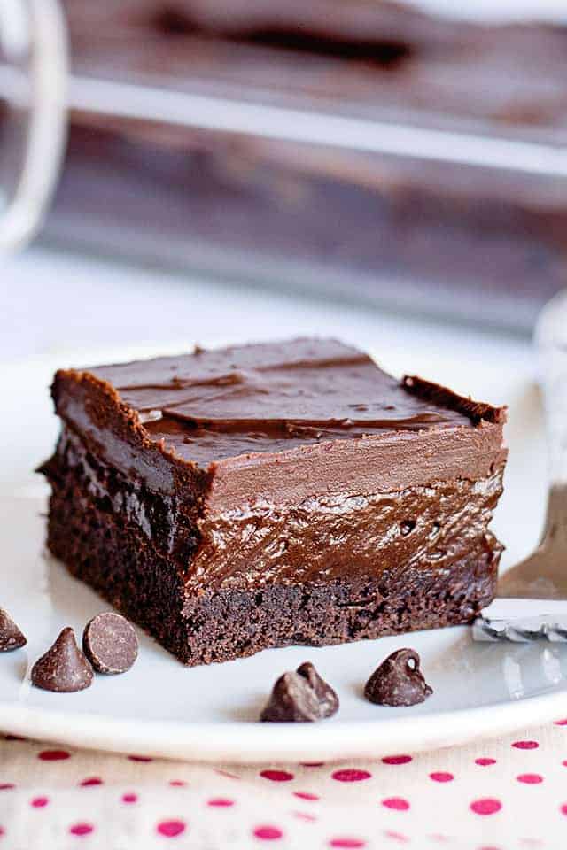 white plate with chocolate chips and a chocolate pudding bar