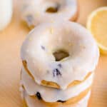 stack of donuts on a yellow placemat