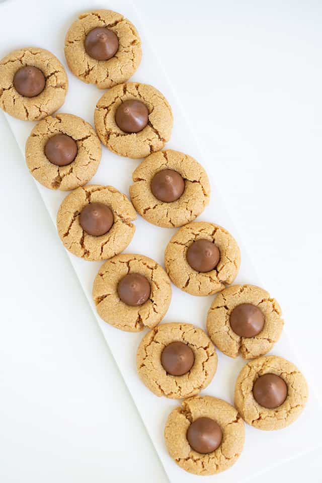 Two rows of Hershey Kiss Cookies on a white platter