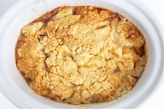 overhead photo of apple cobbler in the crockpot