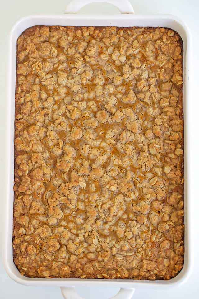 overhead photo of a white pan full of pumpkin crisp