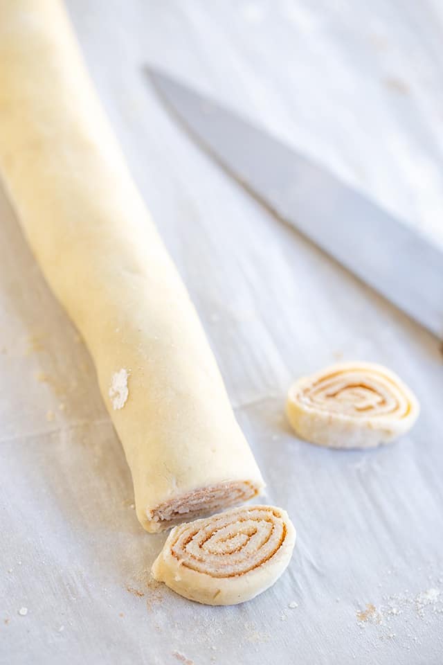 slices of pie crust on a piece of parchment paper