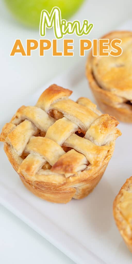 zoomed in image of an apple pie on a white plate with text at the top